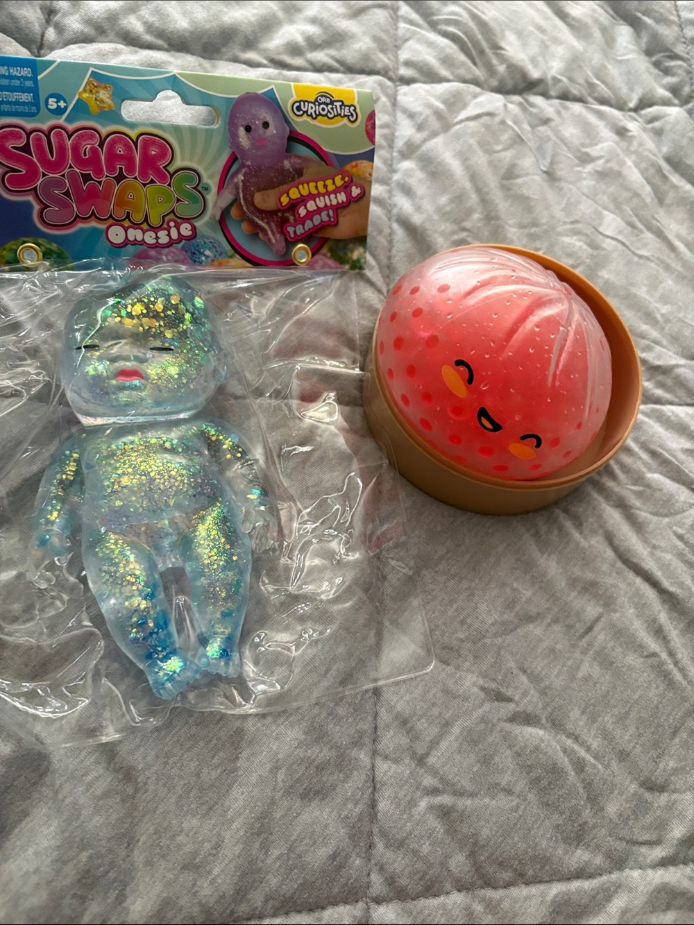 Onesie Squeeze Toy - Pink/Orange Jelly Friend
